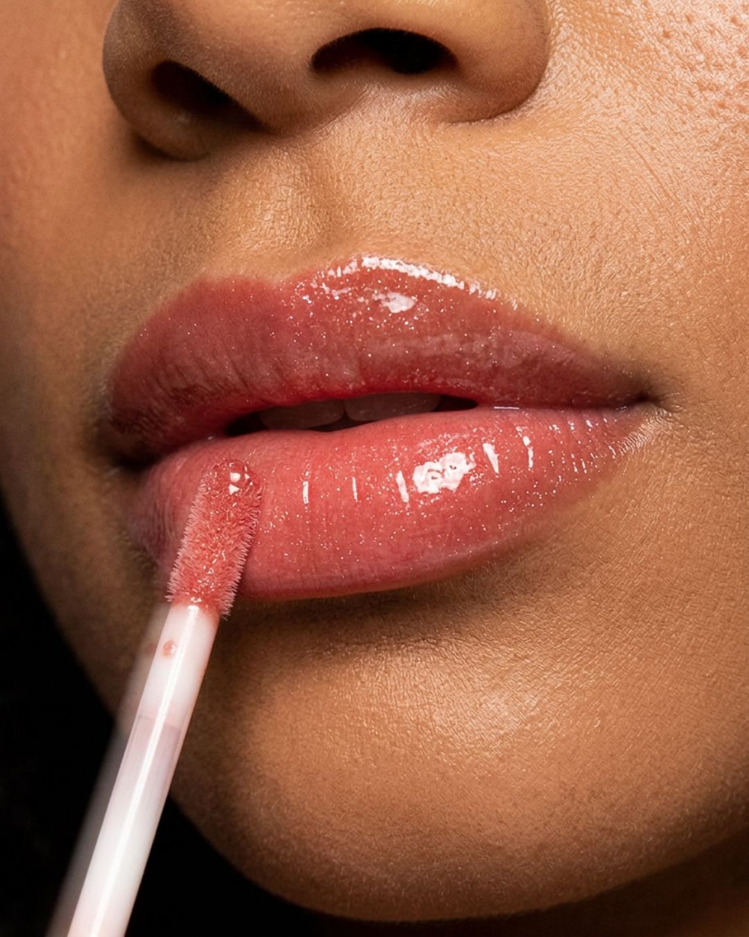 Glossy lips closeup